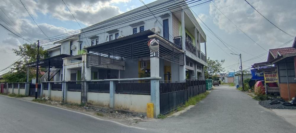 spot on 93001 losmen arkansas syariah