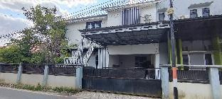 spot on 93001 losmen arkansas syariah