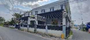 spot on 93001 losmen arkansas syariah