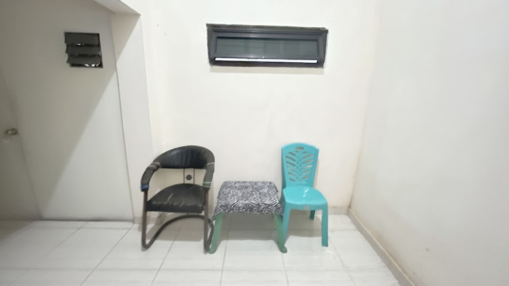 spot on 93001 losmen arkansas syariah