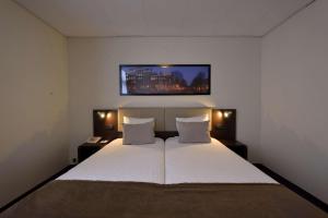 best western dam square inn