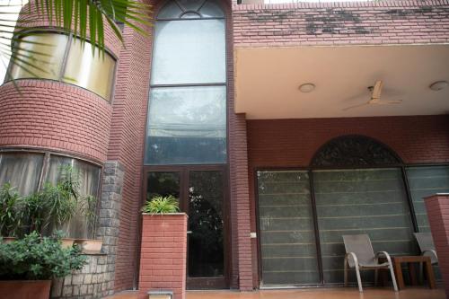 red brick home by earthaa escapes
