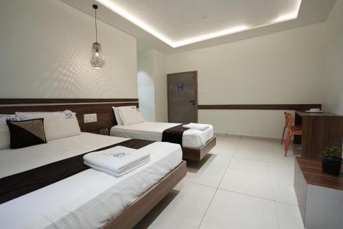 m r residency belagavi