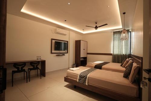 m r residency belagavi