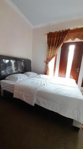 homestay merpati dieng syariah redpartner