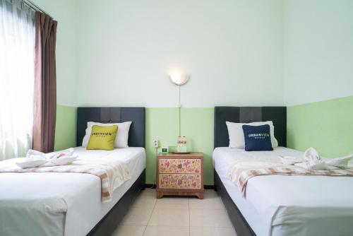 urbanview hotel de kopen malang