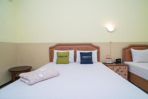 urbanview hotel de kopen malang