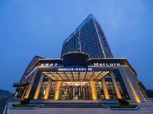 mercure xinyang shengde hotel east high speed railway station