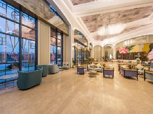 mercure xinyang shengde hotel east high speed railway station