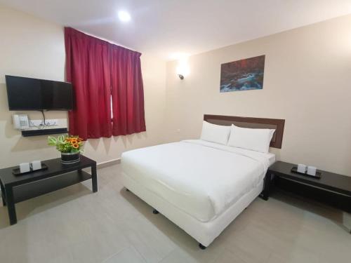 capital o 90897 island city hotel