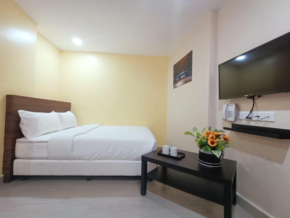 capital o 90897 island city hotel