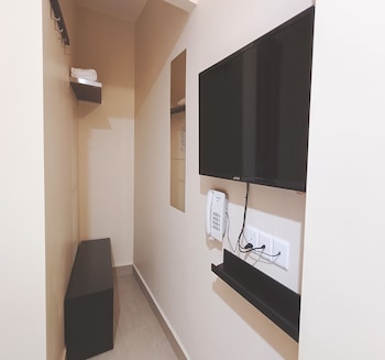 capital o 90897 island city hotel