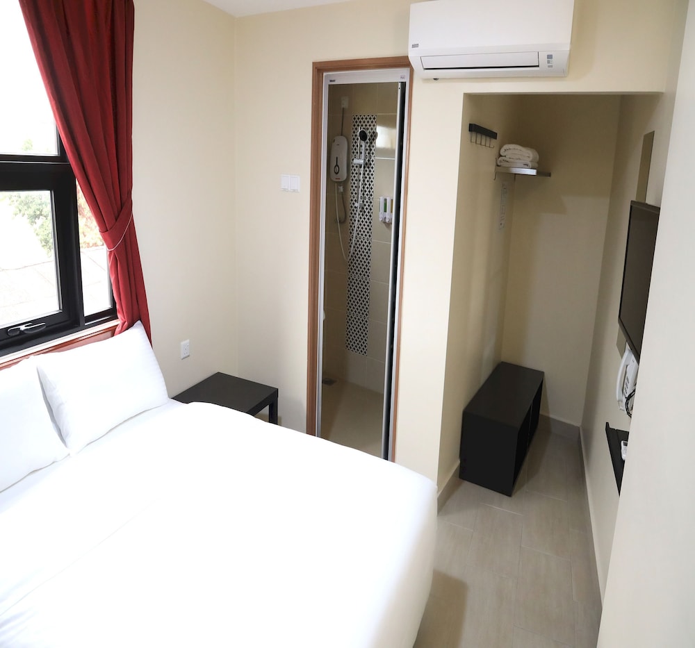 capital o 90897 island city hotel