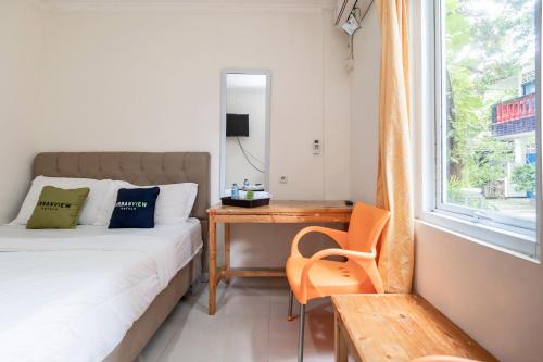 urbanview hotel minongga pondok labu by reddoorz