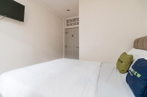 urbanview hotel minongga pondok labu by reddoorz