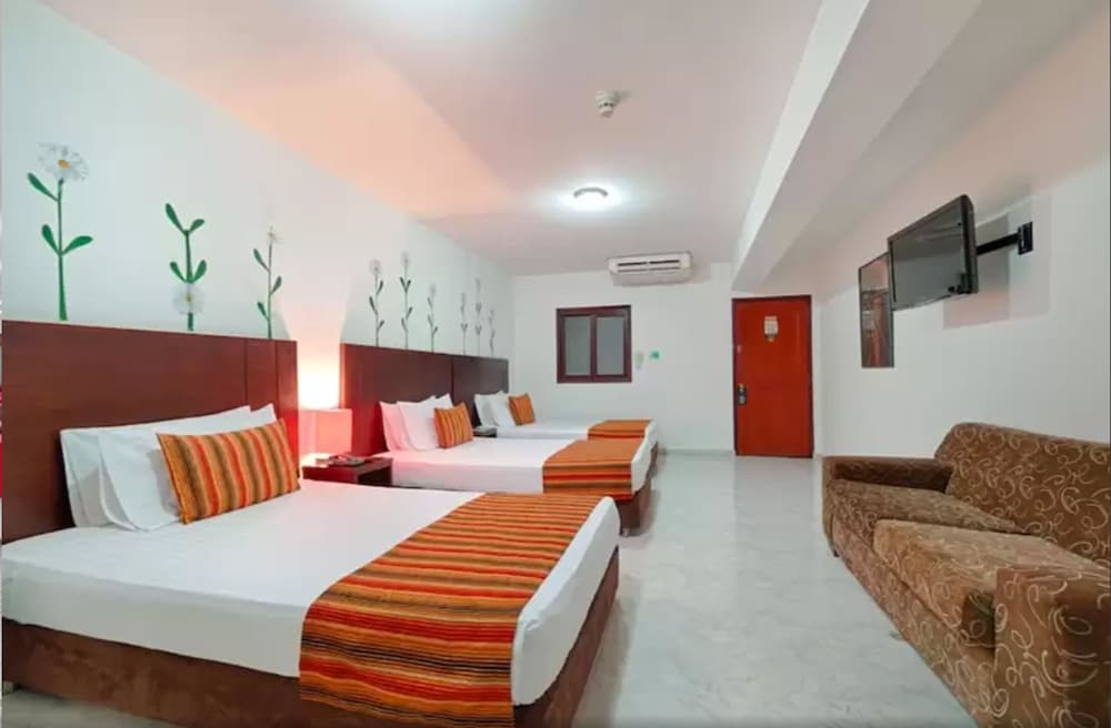 tama hotel granada real cali