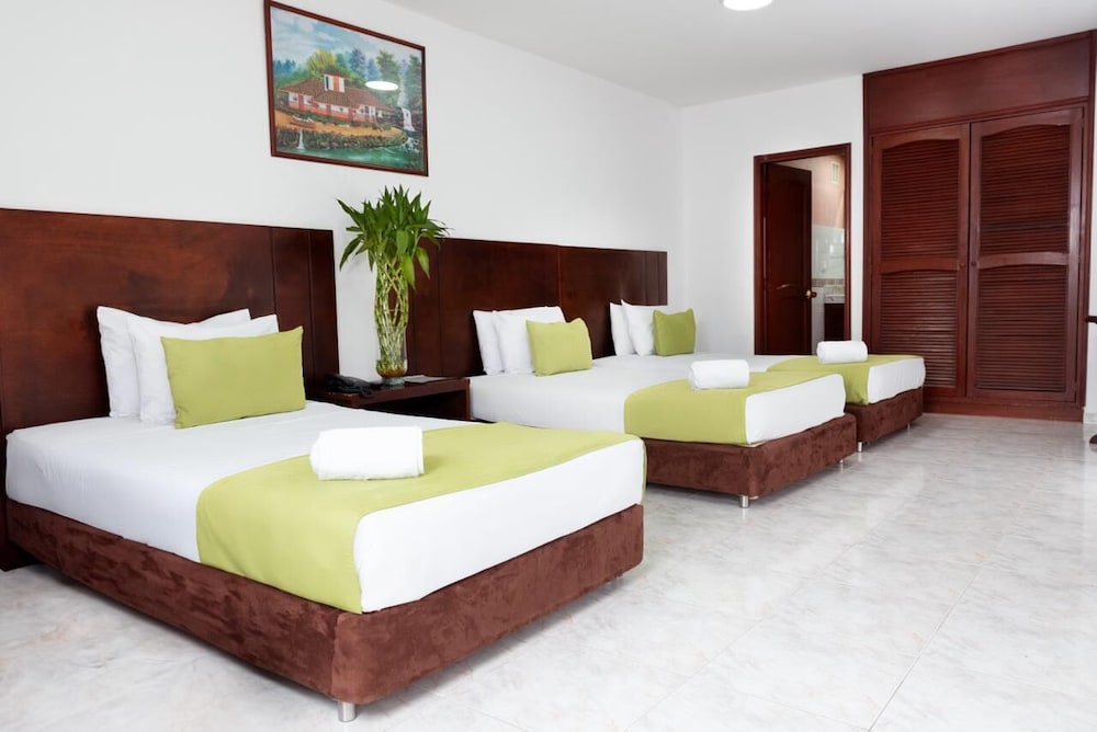 tama hotel granada real cali