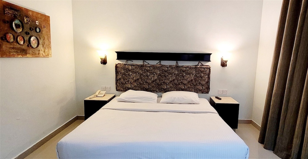 signature inn deira free parking