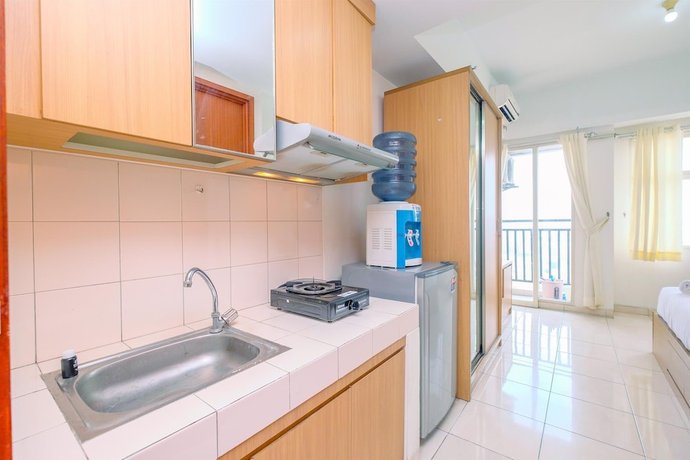 cozy living studio room at margonda residence 3 apartment