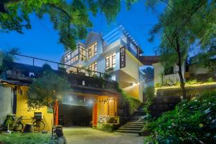 floral hotel baimaya fengxiang yard guesthouse