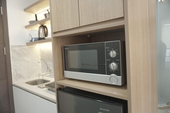 good and homey studio at pacific garden alam sutera apartment