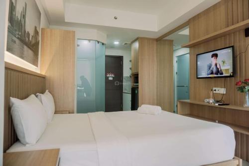 good and homey studio at pacific garden alam sutera apartment