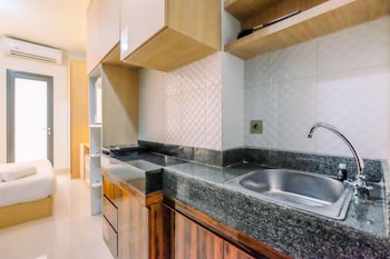 homey and well design studio transpark cibubur apartment