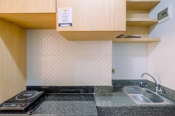 homey and well design studio transpark cibubur apartment