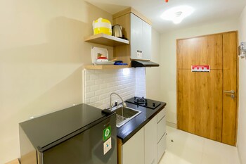 homey and well furnished studio gateway park lrt city bekasi apartment