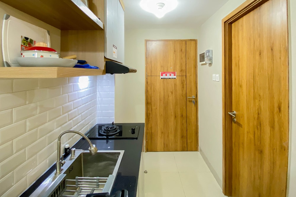 homey and well furnished studio gateway park lrt city bekasi apartment