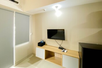 homey and well furnished studio gateway park lrt city bekasi apartment