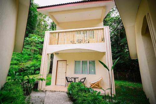 lilla rainforest retreats by swing and pillows