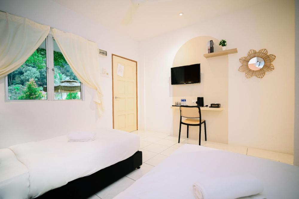 lilla rainforest retreats by swing and pillows