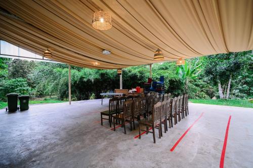 lilla rainforest retreats by swing and pillows