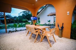 lilla rainforest retreats by swing and pillows