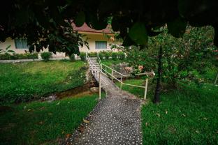 lilla rainforest retreats by swing and pillows