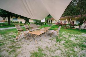 lilla rainforest retreats by swing and pillows