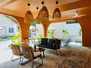 lilla rainforest retreats by swing and pillows