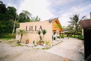 lilla rainforest retreats by swing and pillows