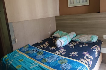 oyo 93386 apartemen grand sentraland by mira