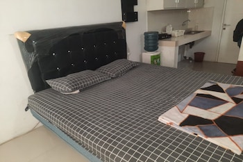 oyo 93386 apartemen grand sentraland by mira