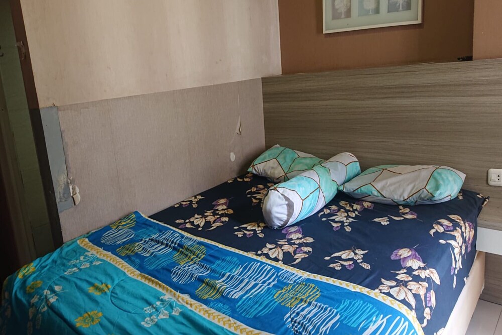 oyo 93386 apartemen grand sentraland by mira