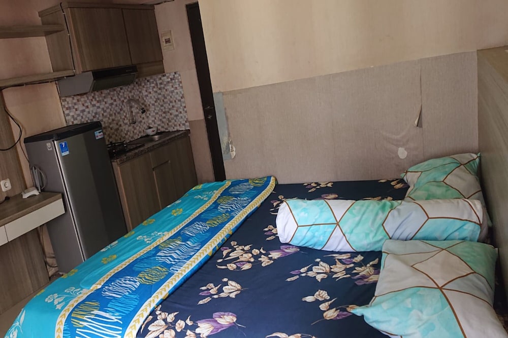 oyo 93386 apartemen grand sentraland by mira