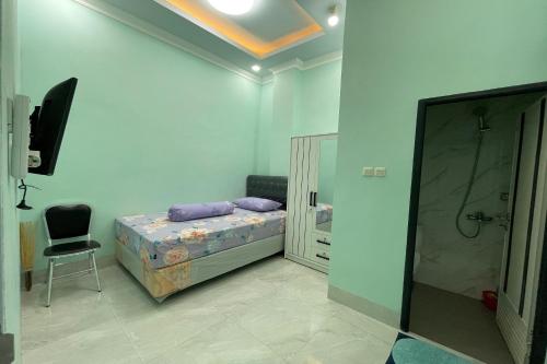 oyo 93664 homestay purirano