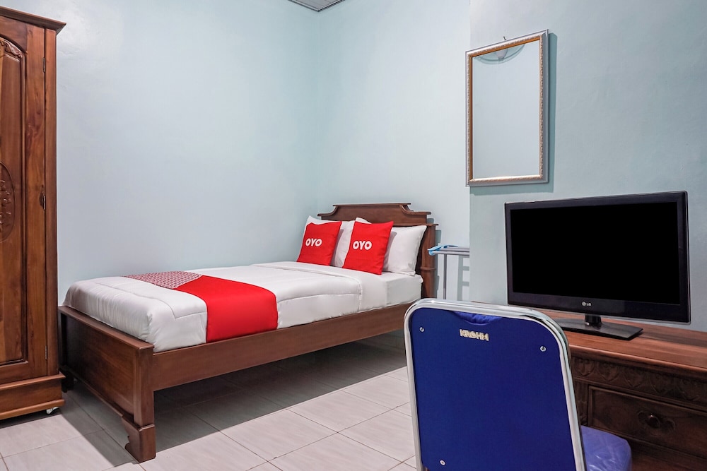 oyo 93695 guest house riharti syariah
