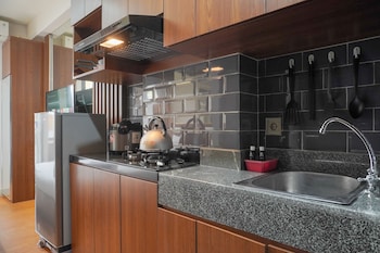 relaxing and homey studio transpark cibubur apartment