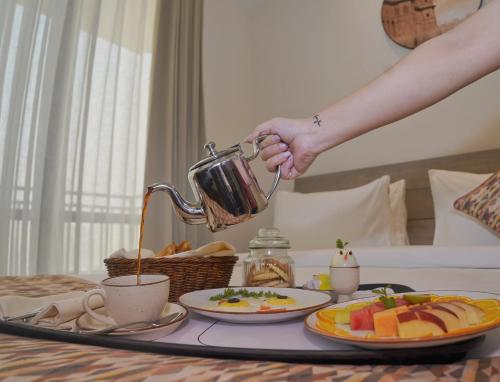 rhythm gurugram hotel and suites sohna road