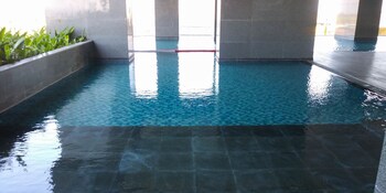 simple and clean 2br at grand sungkono lagoon apartment