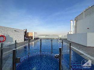 spacious studio with balcony in al majan