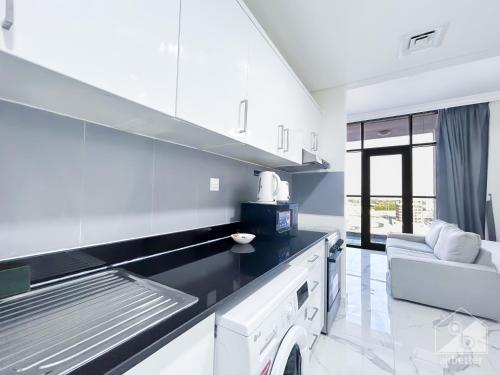 spacious studio with balcony in al majan